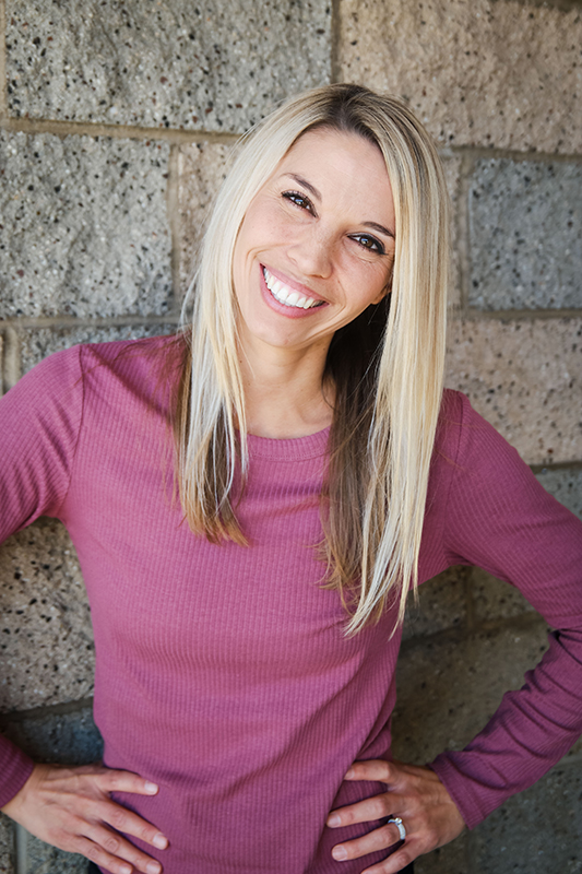 Woman Smiling in Pink shirt - Danielle B